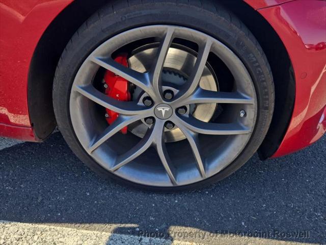 Photo of 2019 Red Multi-Coat Tesla Model 3
