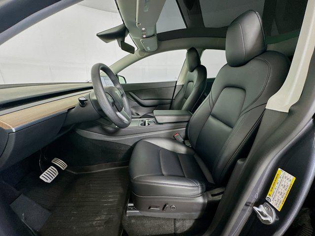 Photo of 2022 Deep Blue Metallic Tesla Model Y