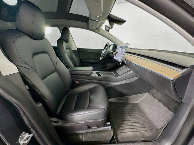 Photo of 2022 Deep Blue Metallic Tesla Model Y