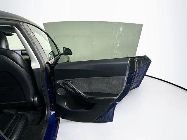 Photo of 2024 Deep Blue Metallic Tesla Model Y