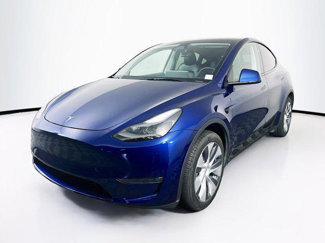 Photo of 2024 Deep Blue Metallic Tesla Model Y
