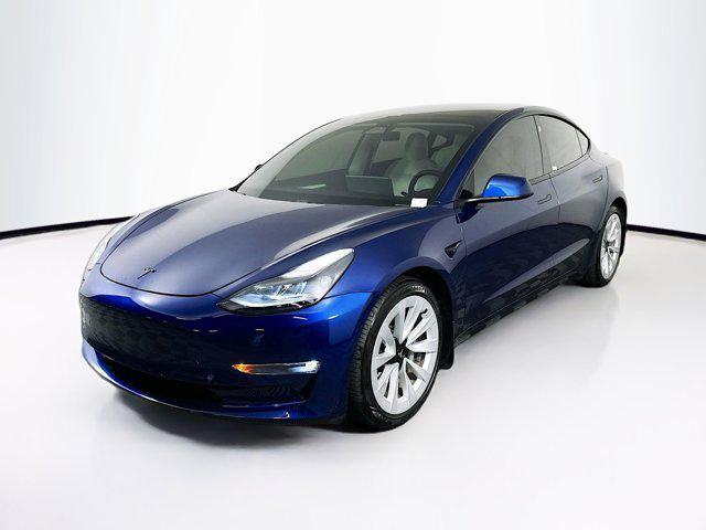 Photo of 2021 Deep Blue Metallic Tesla Model 3