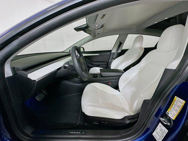Photo of 2021 Deep Blue Metallic Tesla Model 3