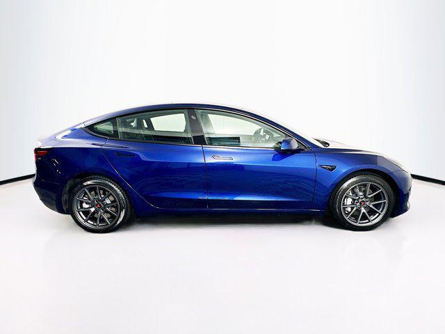 Photo of 2023 Deep Blue Metallic Tesla Model 3
