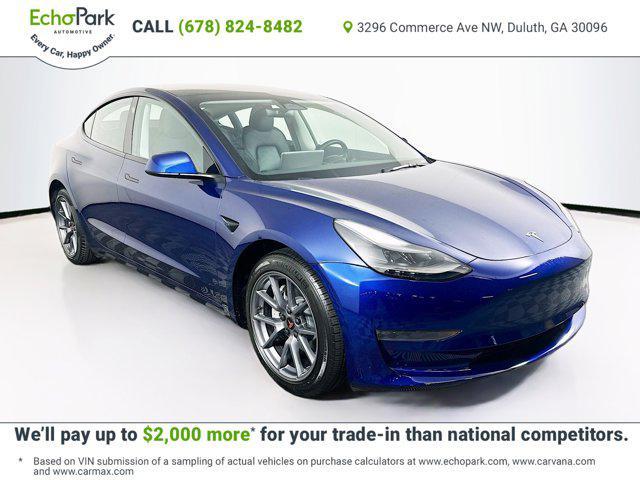 Photo of 2023 Deep Blue Metallic Tesla Model 3