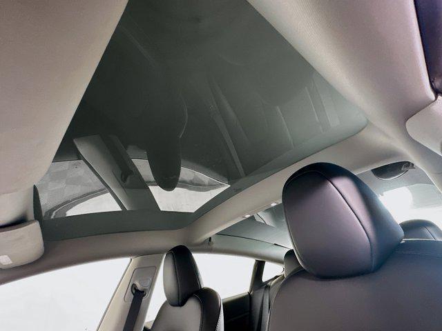 Photo of 2023 Deep Blue Metallic Tesla Model 3
