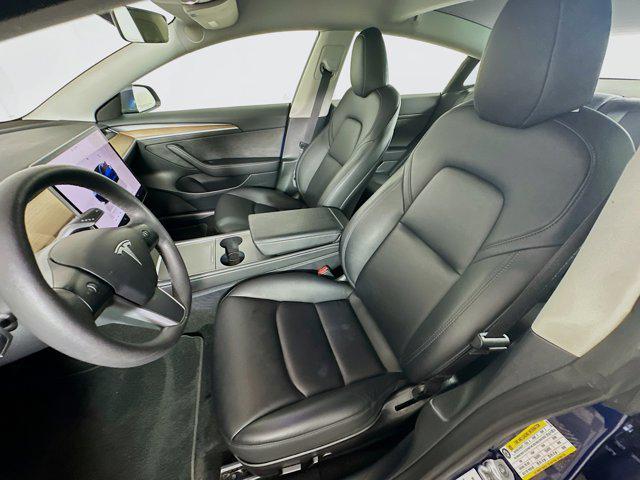 Photo of 2023 Deep Blue Metallic Tesla Model 3
