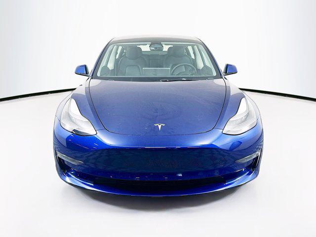 Photo of 2023 Deep Blue Metallic Tesla Model 3