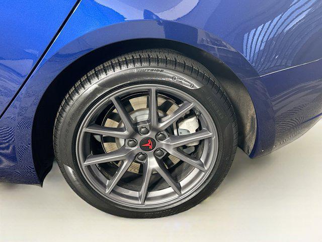 Photo of 2023 Deep Blue Metallic Tesla Model 3