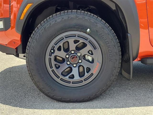 Photo of 2025 Afterburn Orang Nissan Frontier