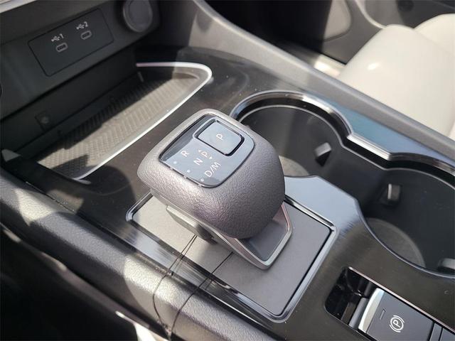 Photo of 2025 White / Black Nissan Rogue