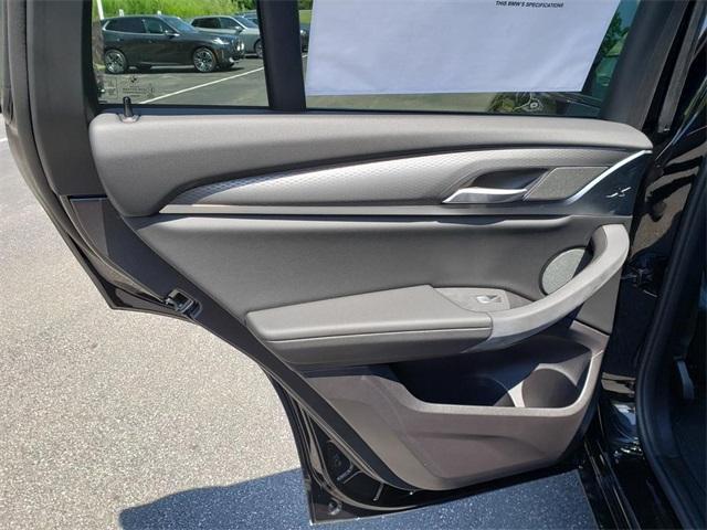 Photo of 2025 Black Sapphire Metallic BMW X4