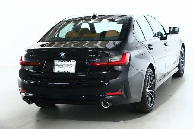 Photo of 2022 Jet Black BMW 330