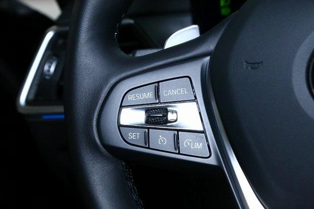 Photo of 2023 Jet Black BMW 330