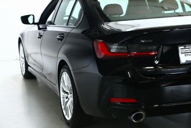 Photo of 2023 Jet Black BMW 330