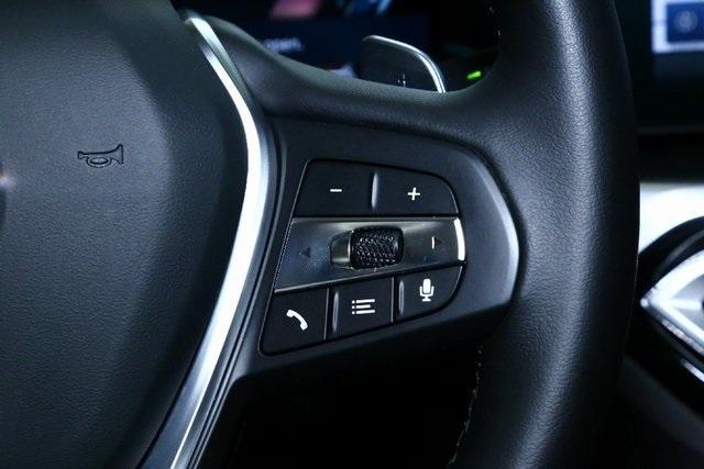 Photo of 2023 Jet Black BMW 330