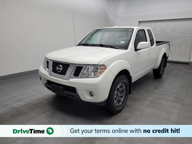 Photo of 2014 Glacier White Nissan Frontier