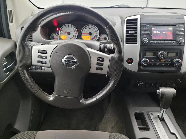 Photo of 2014 Glacier White Nissan Frontier