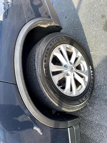 Photo of 2015 Arctic Blue Metallic Nissan Rogue