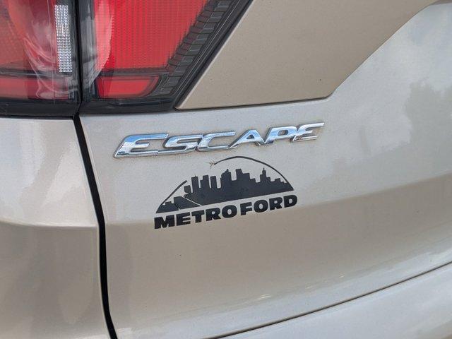 Photo of 2017 Ruby Red Metallic Tinted Clearcoat Ford Escape
