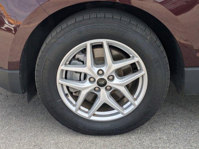 Photo of 2024 Burgundy Velvet Metallic Tinted Clearcoat Ford Edge