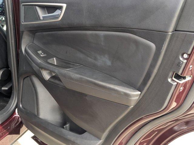 Photo of 2024 Burgundy Velvet Metallic Tinted Clearcoat Ford Edge
