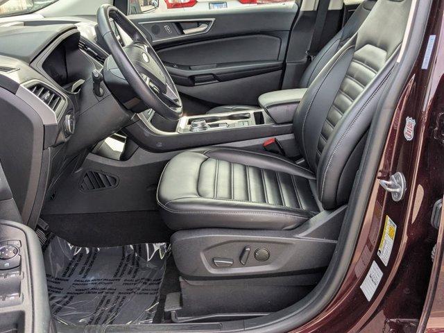 Photo of 2024 Burgundy Velvet Metallic Tinted Clearcoat Ford Edge