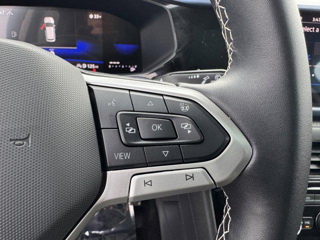 Photo of 2024 White Volkswagen Taos