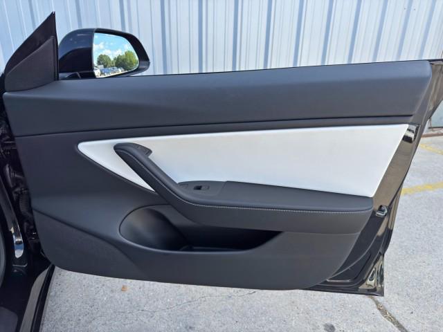 Photo of 2021 Solid Black Tesla Model 3