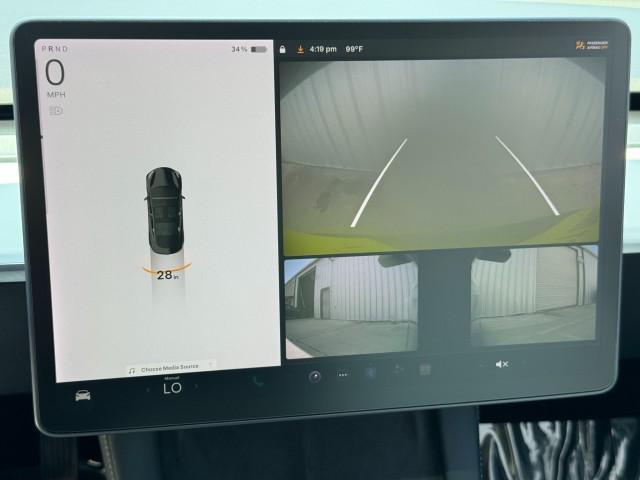 Photo of 2021 Solid Black Tesla Model 3