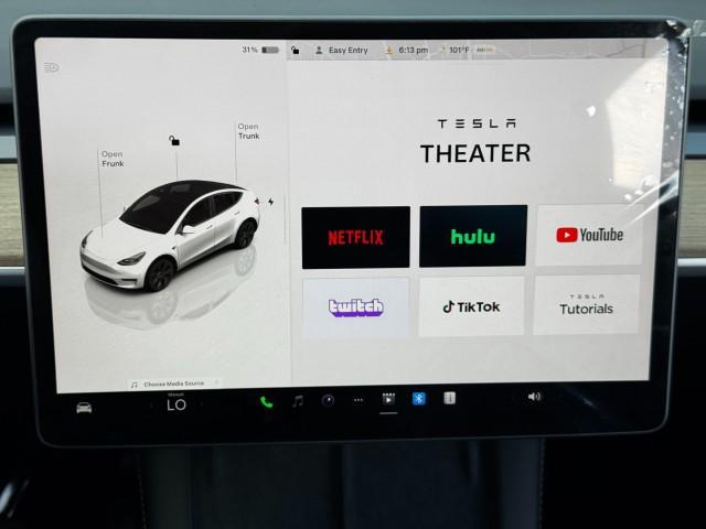 Photo of 2025 Pearl White Multi-Coat Tesla Model Y
