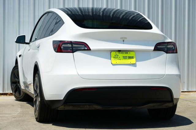 Photo of 2025 Pearl White Multi-Coat Tesla Model Y