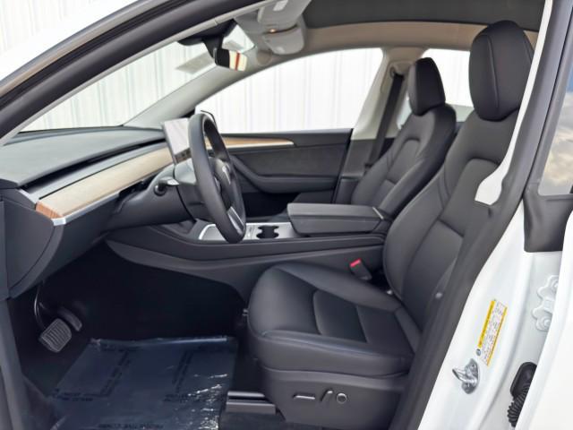 Photo of 2025 Pearl White Multi-Coat Tesla Model Y
