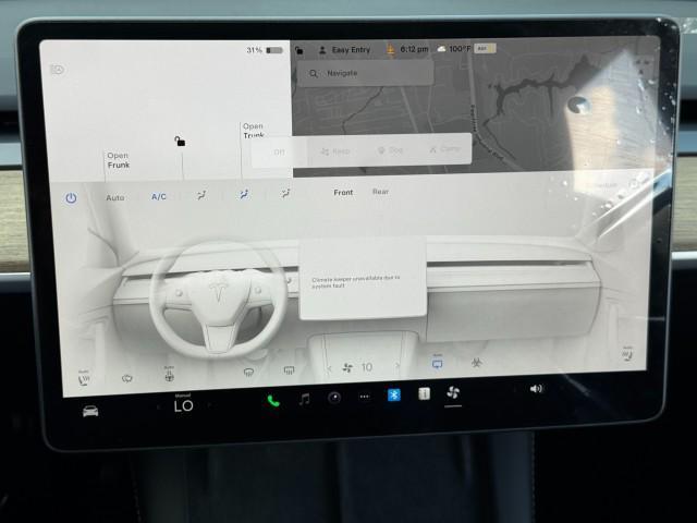 Photo of 2025 Pearl White Multi-Coat Tesla Model Y