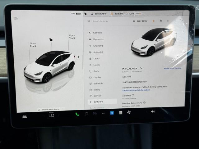 Photo of 2025 Pearl White Multi-Coat Tesla Model Y
