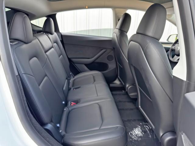Photo of 2025 Pearl White Multi-Coat Tesla Model Y