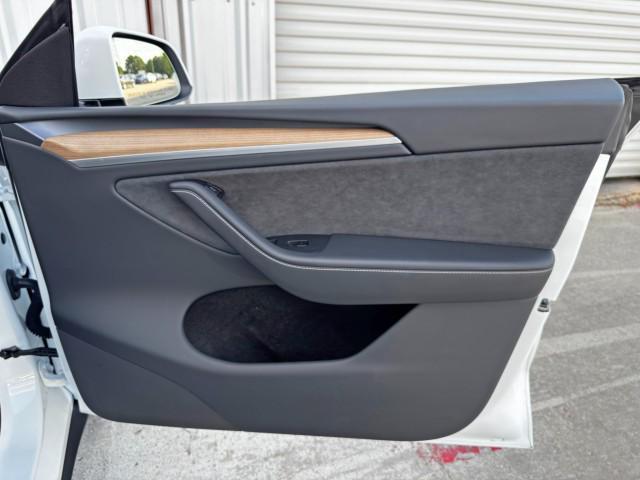 Photo of 2025 Pearl White Multi-Coat Tesla Model Y