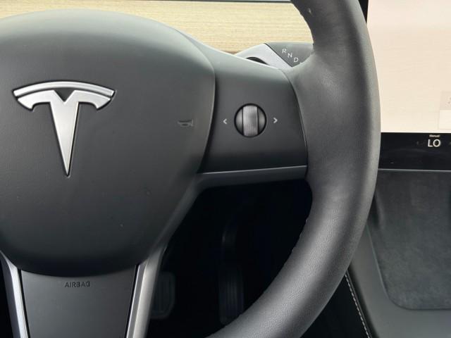 Photo of 2025 Pearl White Multi-Coat Tesla Model Y
