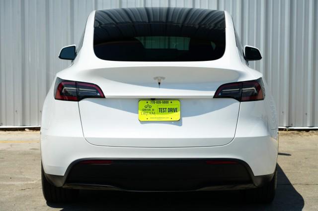 Photo of 2025 Pearl White Multi-Coat Tesla Model Y