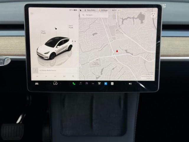 Photo of 2025 Pearl White Multi-Coat Tesla Model Y