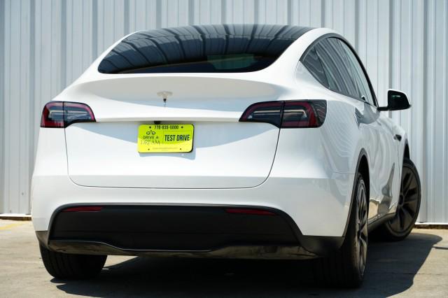 Photo of 2025 Pearl White Multi-Coat Tesla Model Y