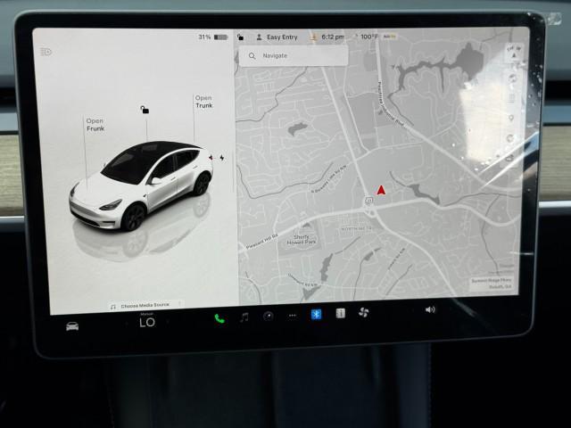 Photo of 2025 Pearl White Multi-Coat Tesla Model Y