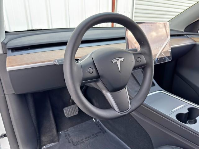Photo of 2025 Pearl White Multi-Coat Tesla Model Y