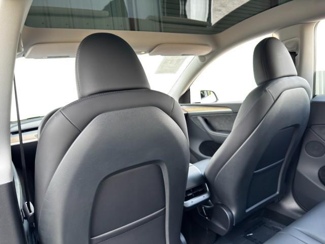 Photo of 2025 Pearl White Multi-Coat Tesla Model Y