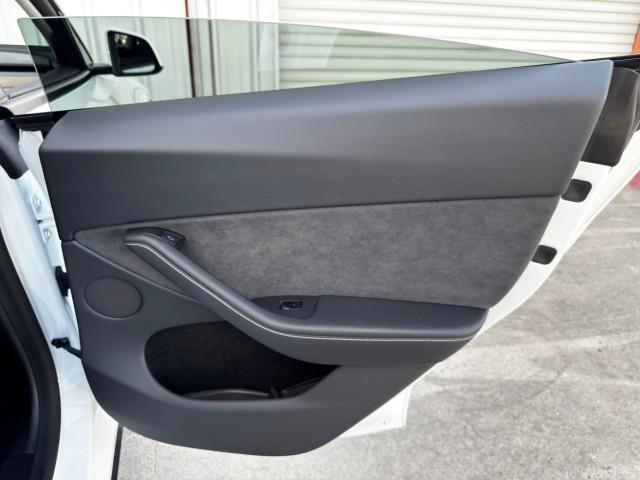 Photo of 2025 Pearl White Multi-Coat Tesla Model Y