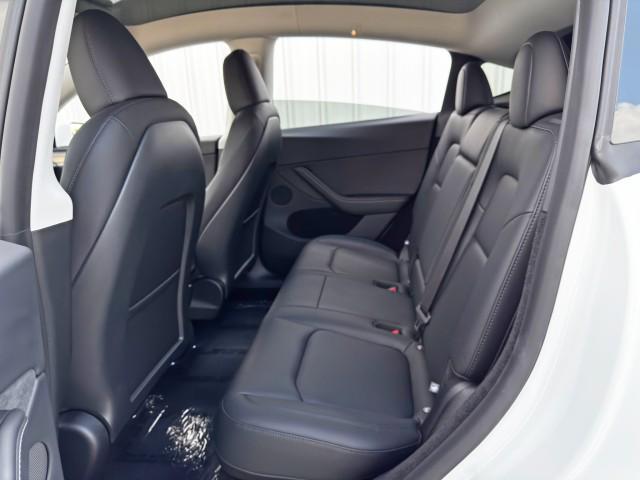 Photo of 2025 Pearl White Multi-Coat Tesla Model Y