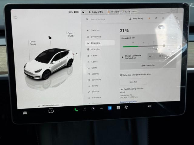 Photo of 2025 Pearl White Multi-Coat Tesla Model Y