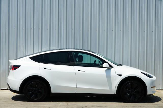Photo of 2025 Pearl White Multi-Coat Tesla Model Y