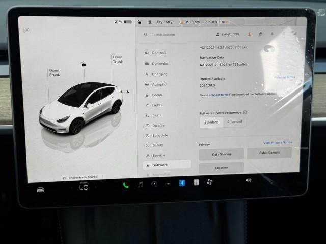 Photo of 2025 Pearl White Multi-Coat Tesla Model Y