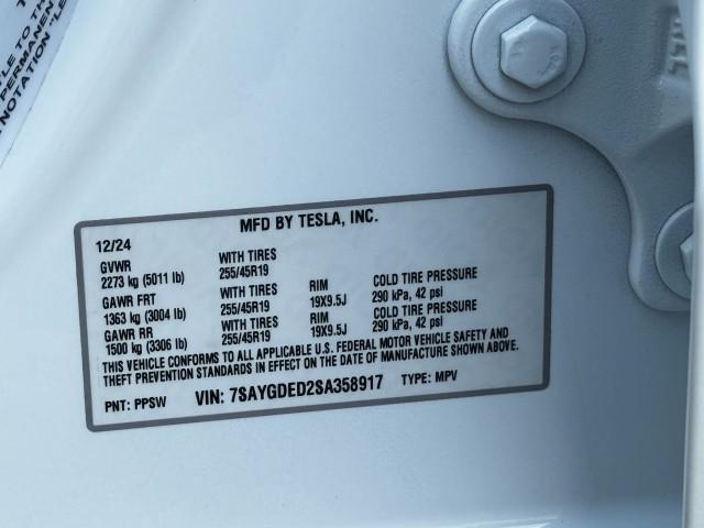 Photo of 2025 Pearl White Multi-Coat Tesla Model Y